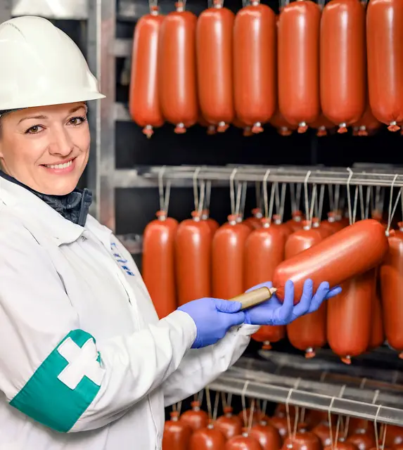 Sausages being monitored